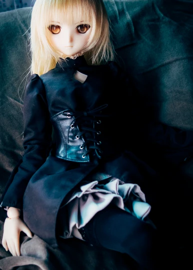 a doll that is dressed like she appears to be a real life