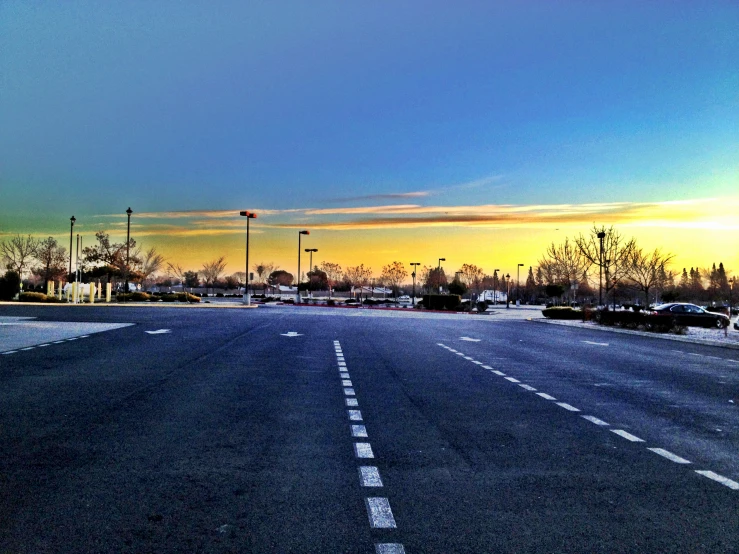 a stop sign stands out in the sunset