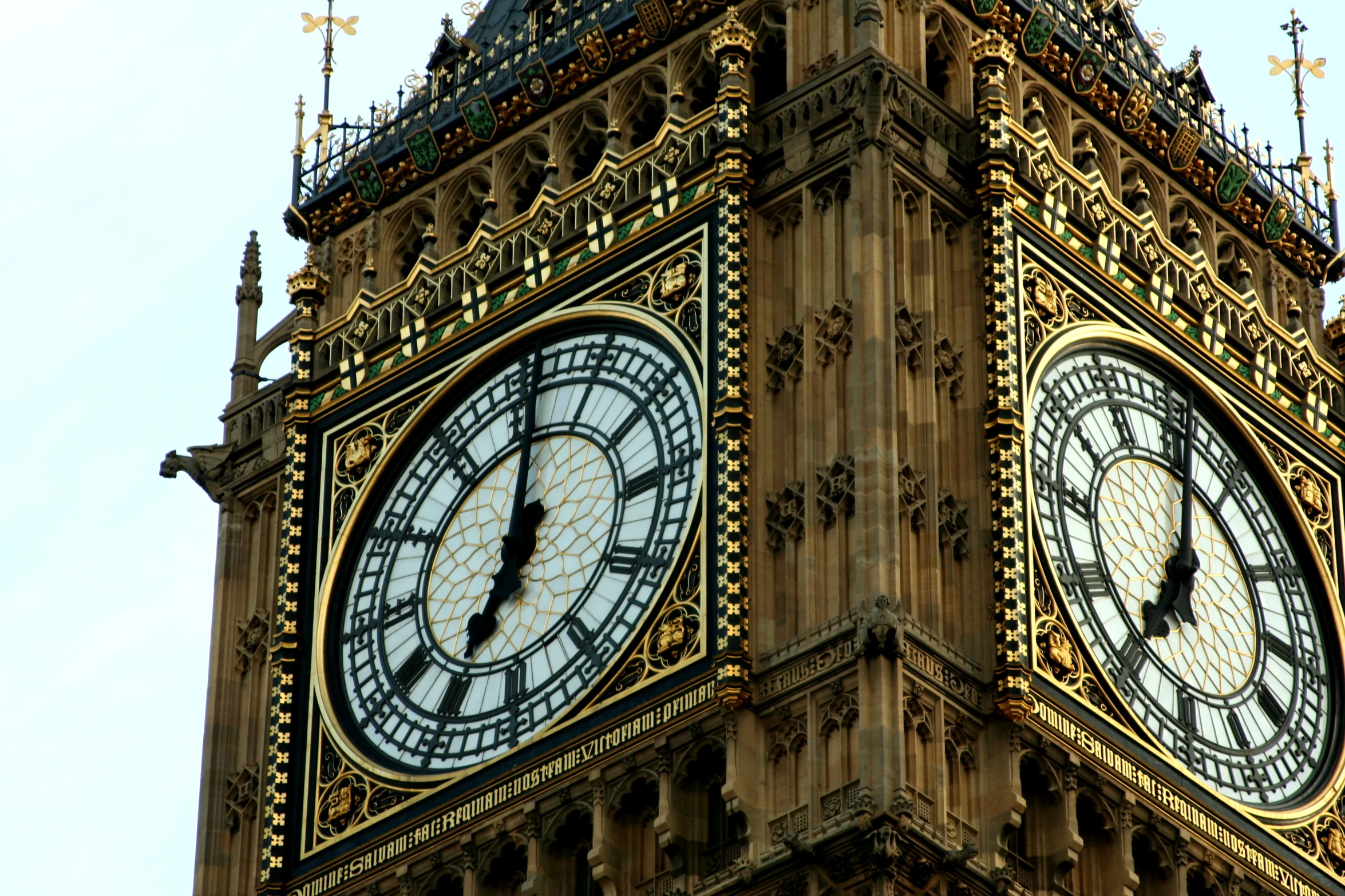 the clock is on the tower of a building