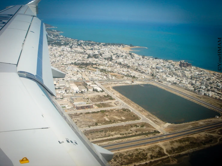 a view from an airplane of an area outside the city