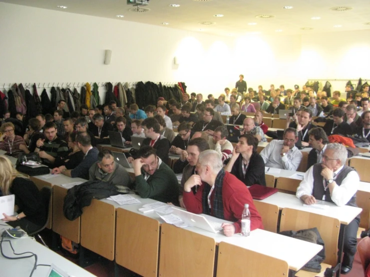 a room full of students and a judge