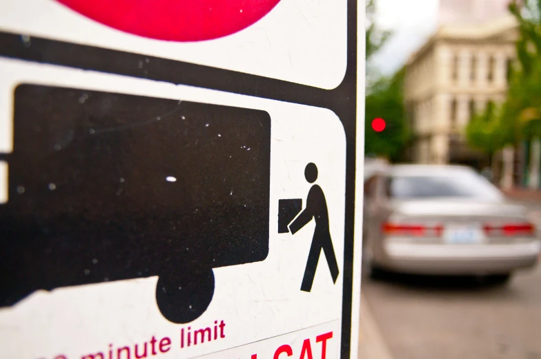 a close up image of an automobile on the street