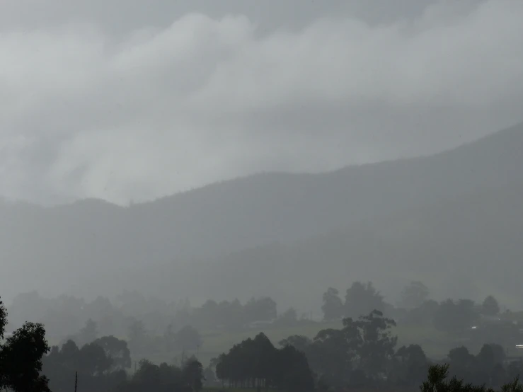 a foggy day on the mountains is about to come