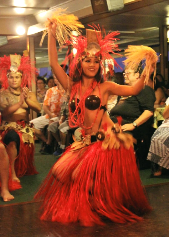 a couple dancers performing on the street