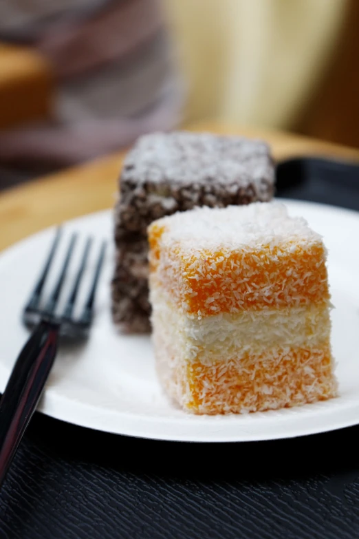 small pieces of cake sit on a plate