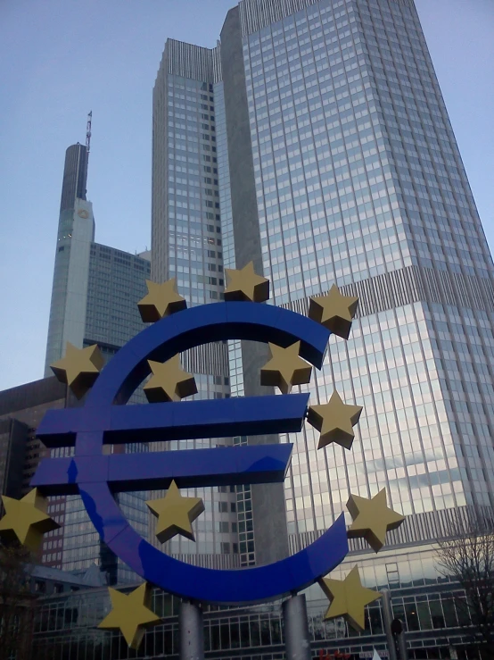 a large sign that has the euro sign on it