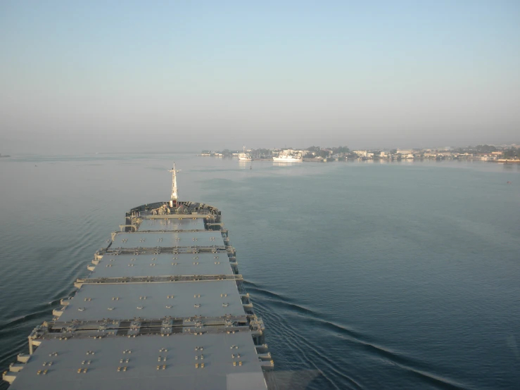 a tugboat that is on some water