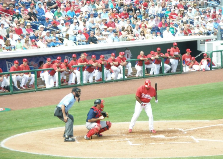 a baseball game is being played with many fans