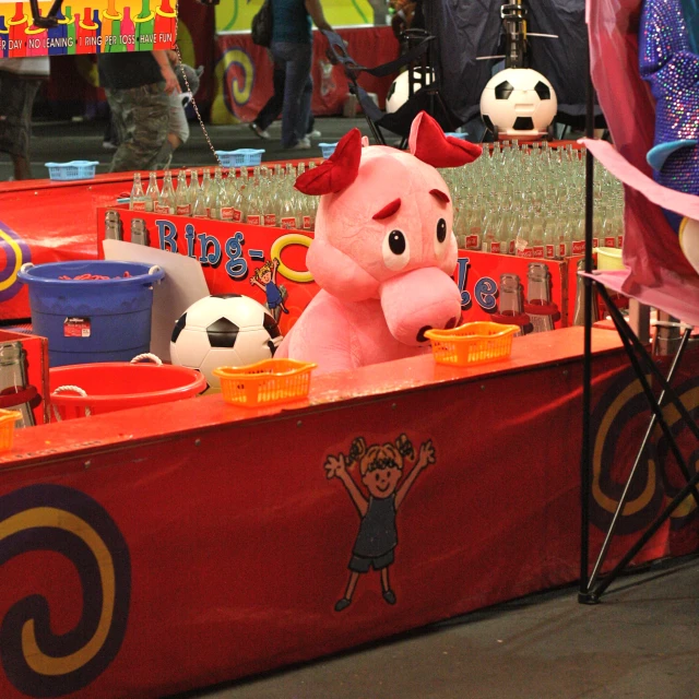 toys at a carnival with bottles of water on the table