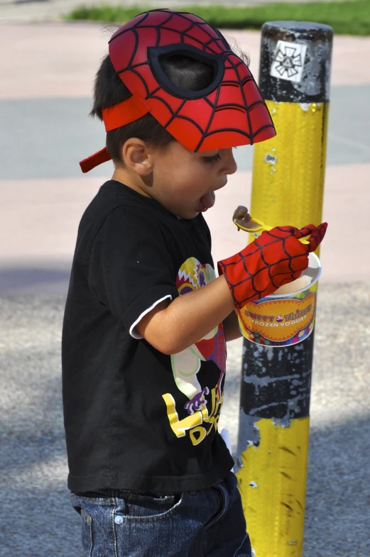 a child in a spider man costume