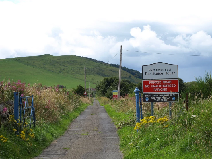 a road with a sign on the side of it