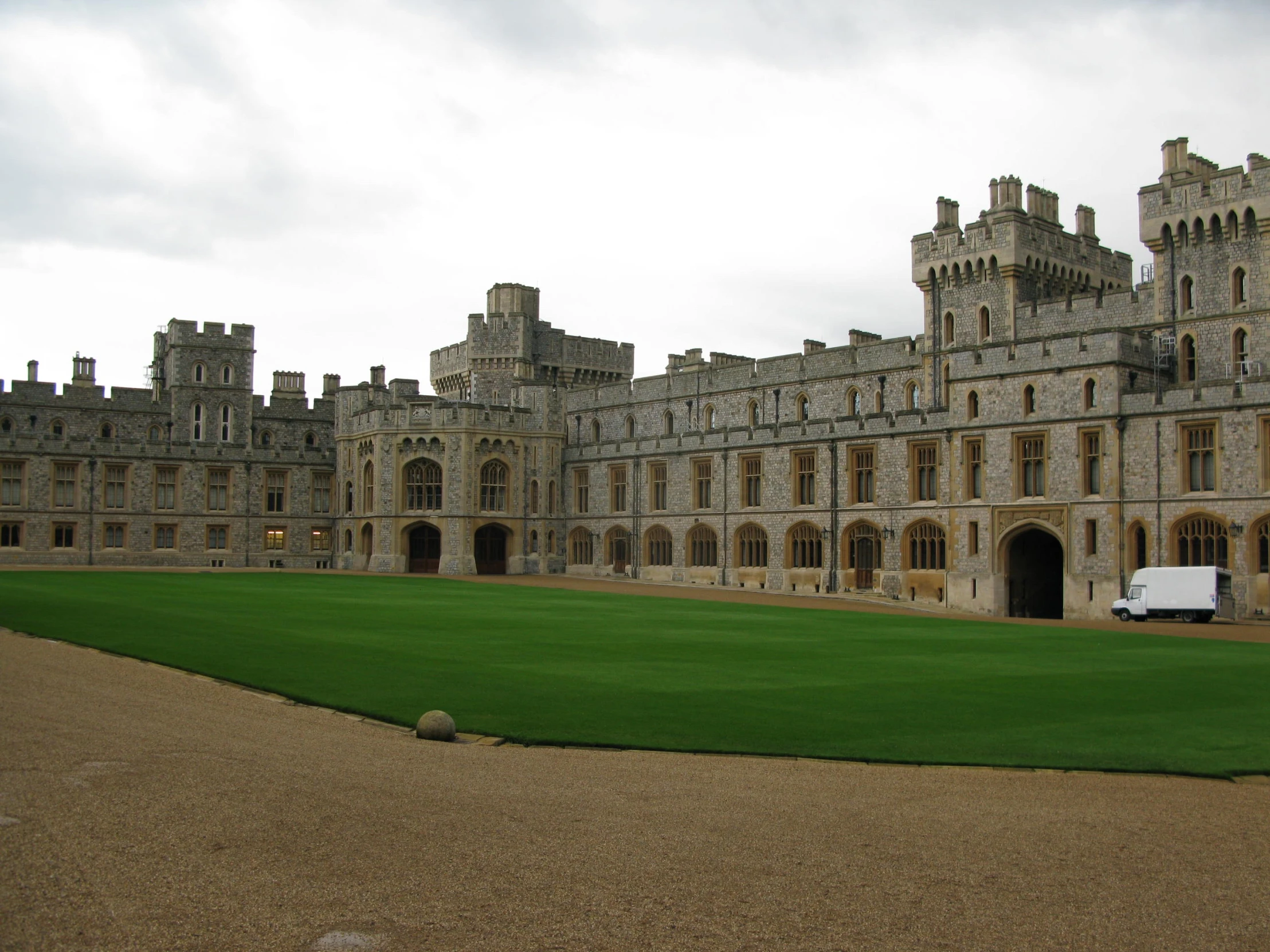 a large castle like building on the side of a road