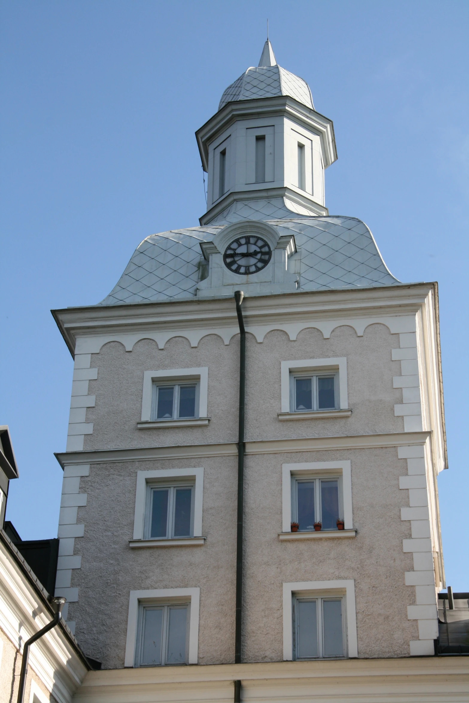 a tower with a clock sitting on the top of it