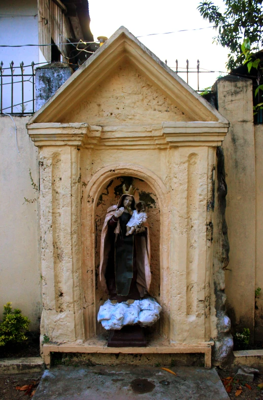 statue of jesus sitting in outdoor shrine