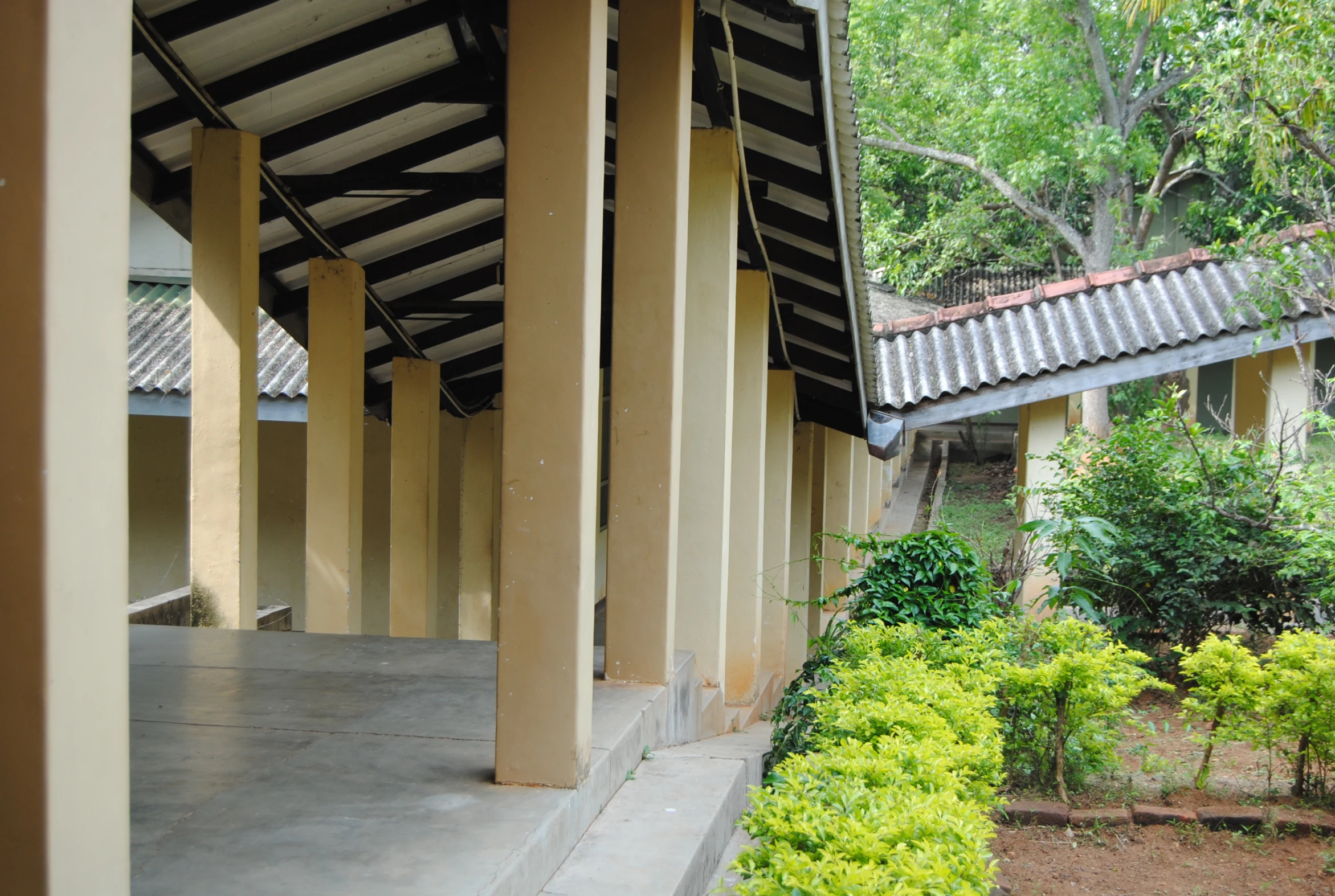 a couple of pillars in front of a building