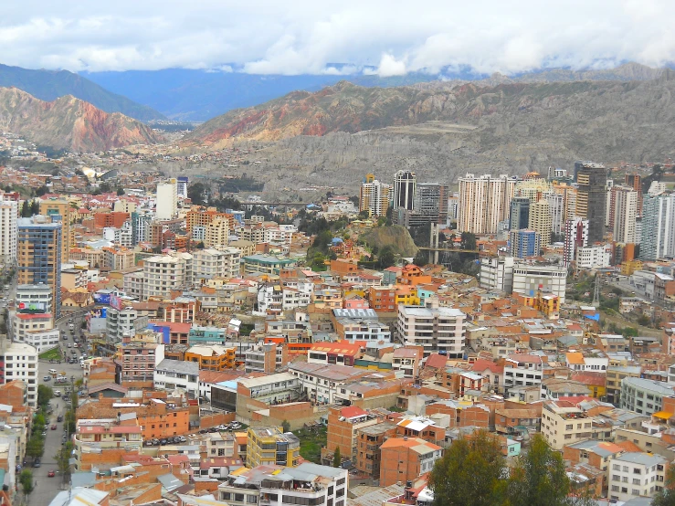 a city with mountains in the background