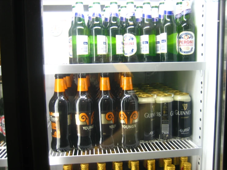 a beer case containing 12 bottles of various kinds