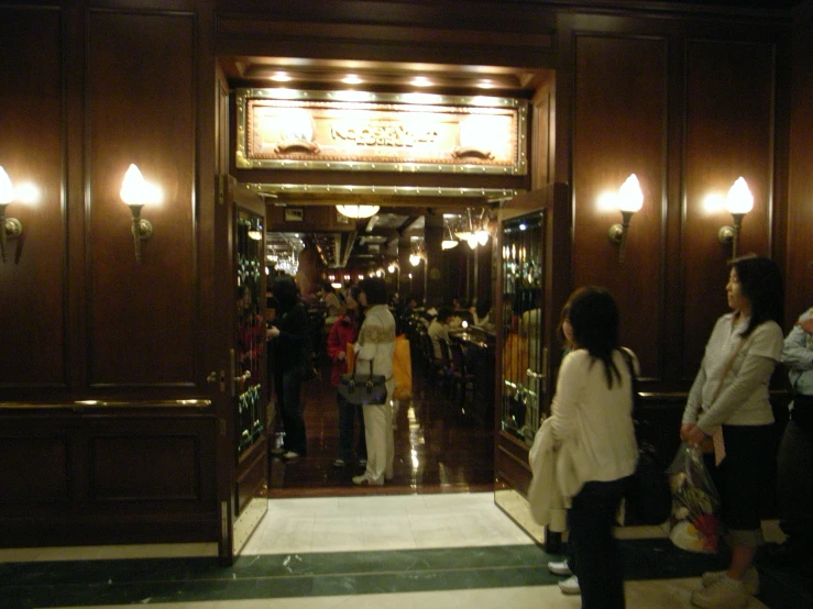 the doorway to the entrance of a building is covered with decorative light