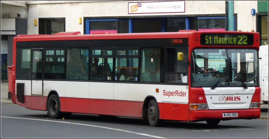 a city bus making a turn onto the street