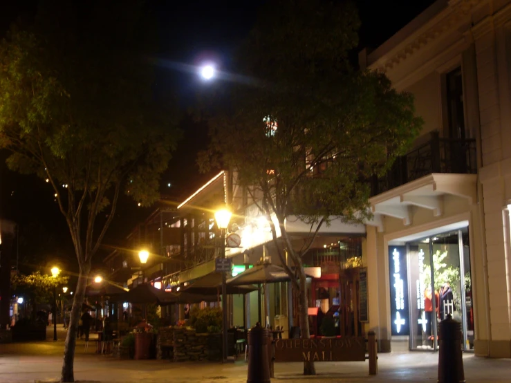 an empty street at night with no traffic