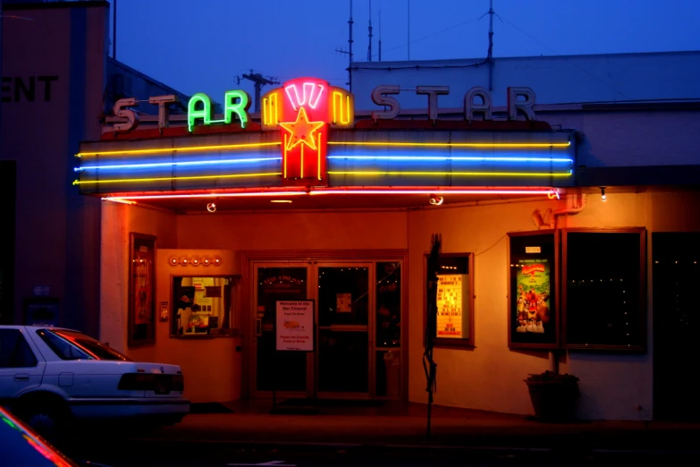 a starwood movie theatre sign at night