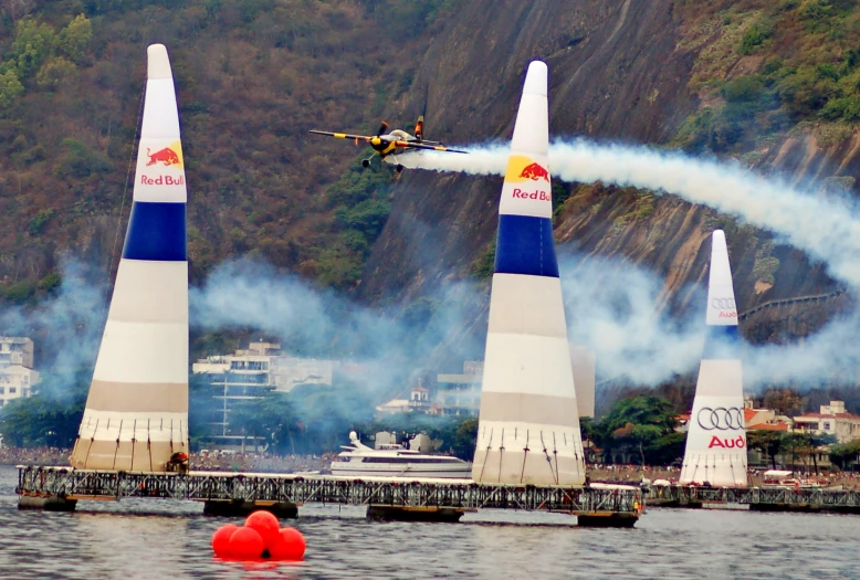 an aerial stunt boat passing some water