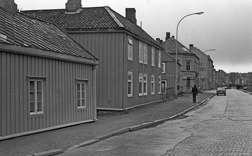 a man that is standing in the street