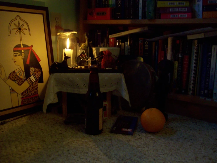 a room with a small table with a cloth covered table