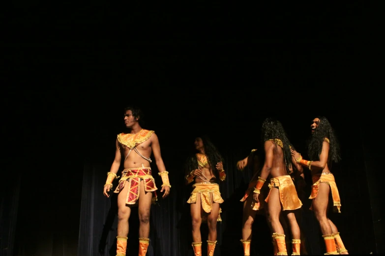 a runway display showing different kinds of women dressed in african style clothing