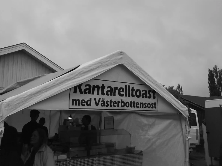 the tent in black and white is a tent with food on it