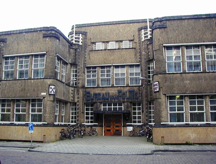 a building with bicycles parked outside the doorway