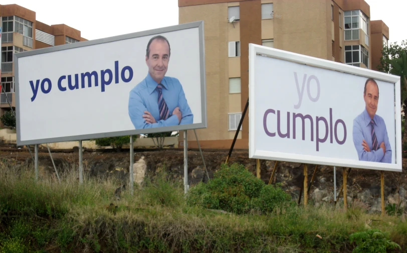a few billboards displaying political results in the city