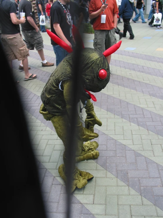 a man in a costume on a street