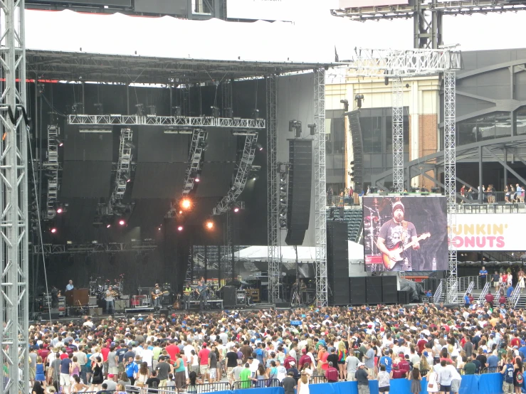 a group of people that are sitting on some stage