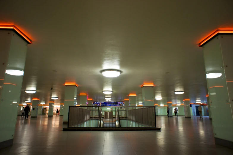 the ceiling in an airport with bright lights