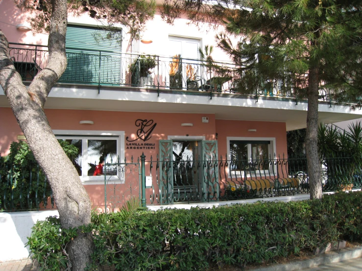 a building with a balcony and some balconies on it