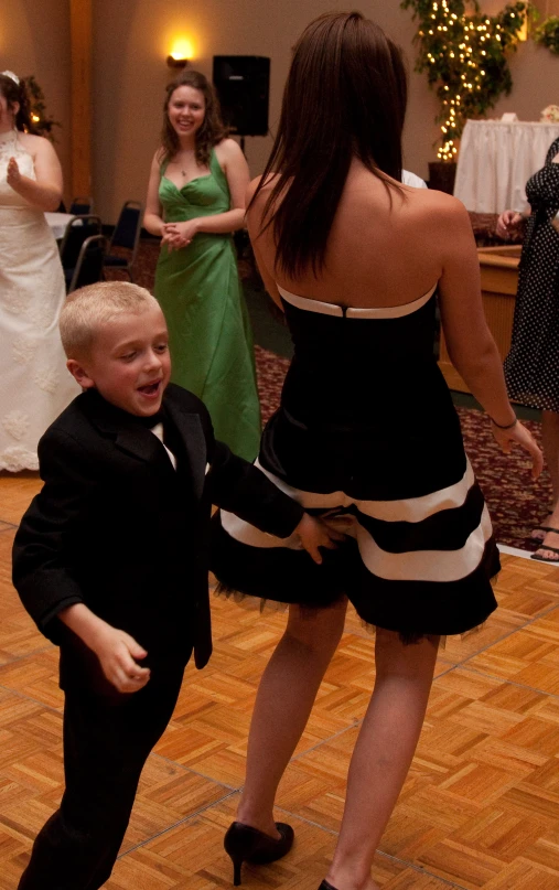 young children are having fun on the dance floor