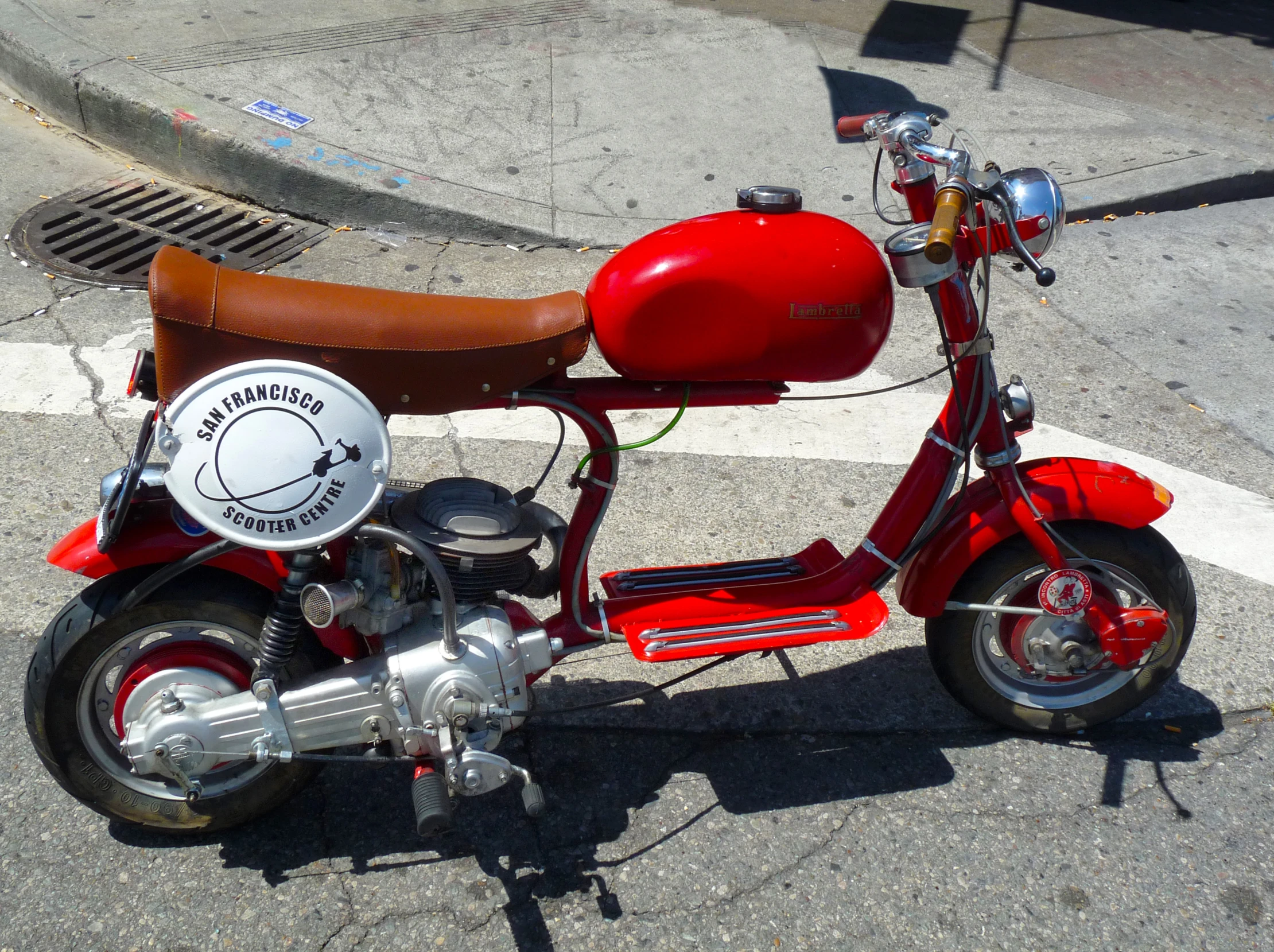 this is an old model vespa that has been put to use as a scooter