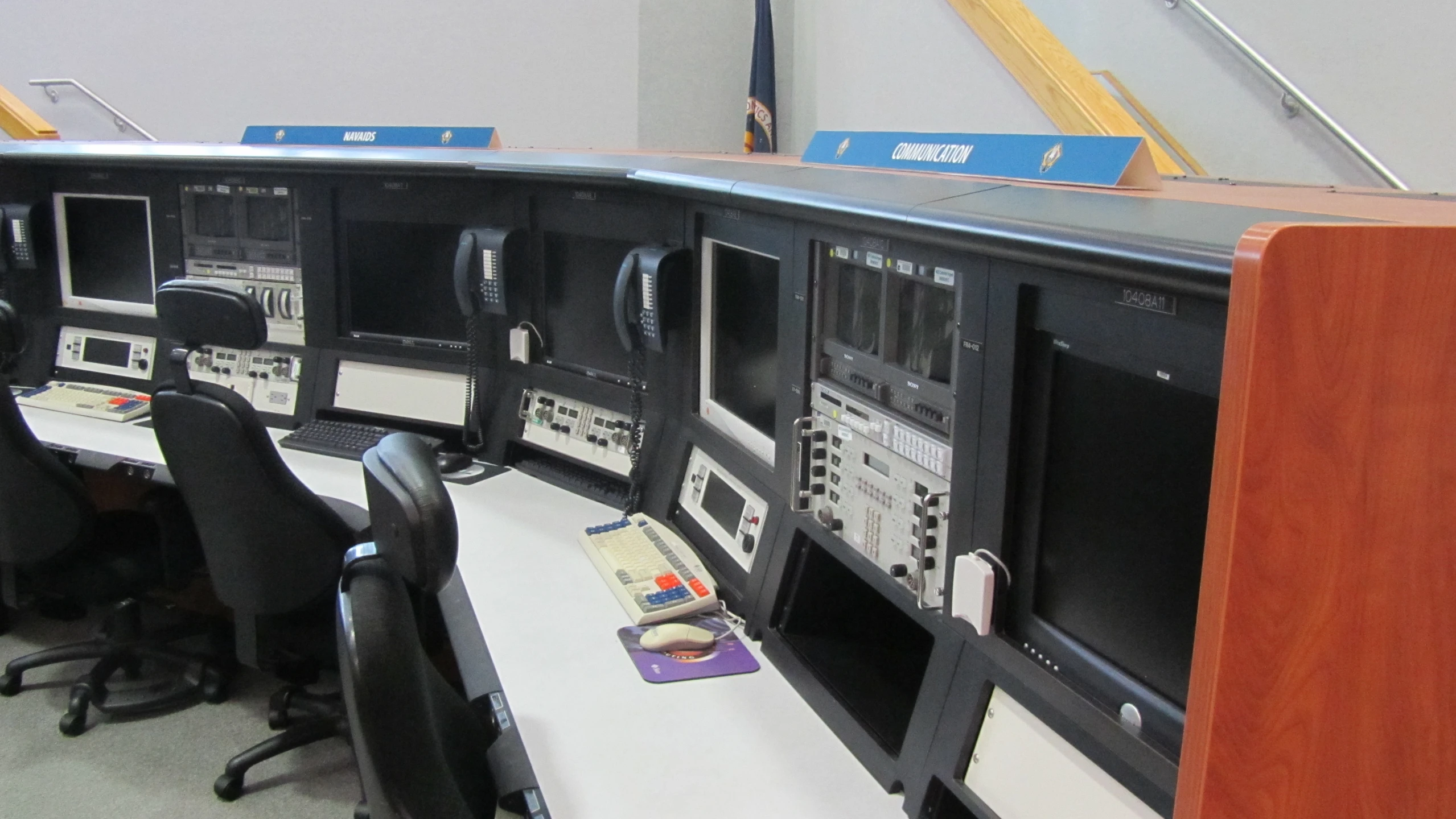 a po of an electronic control room for people