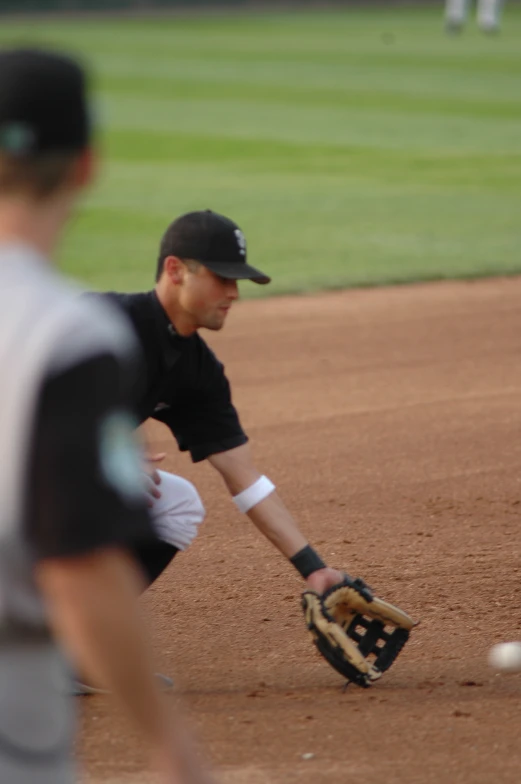 two guys on a baseball field playing baseball