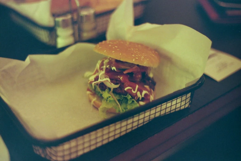 a food item in a basket with wrapping