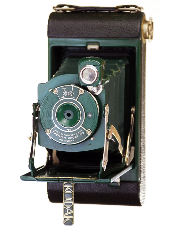 an old fashioned camera sitting on top of a stand