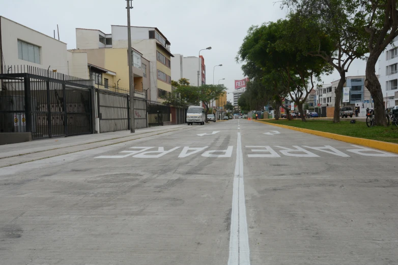 a view of an empty street in a city