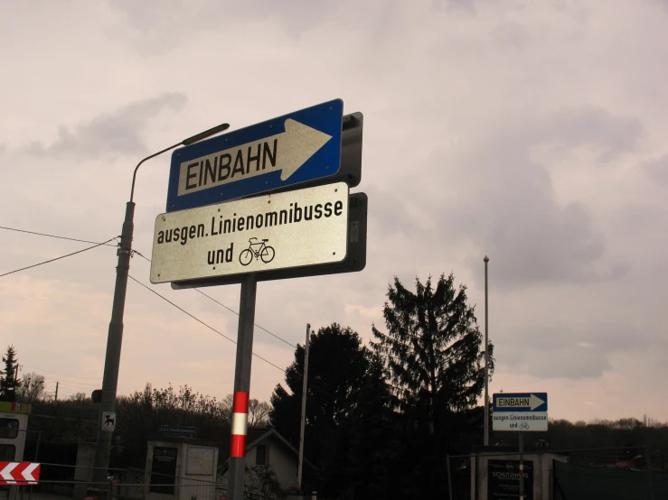 a street sign at an intersection near some buildings