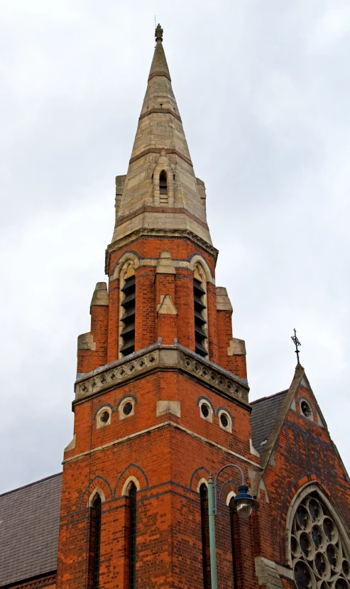 a red brick building with an octagonal tower