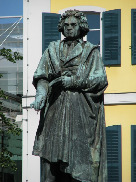 the statue of albertian monroe by some buildings