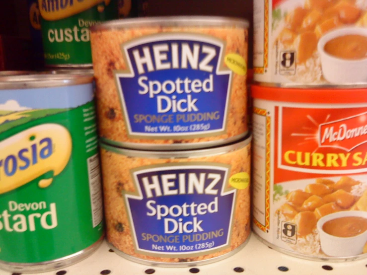 canisters of canned food and two for curry are seen on a shelf