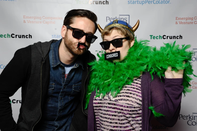 a man and woman in costume posing for a po