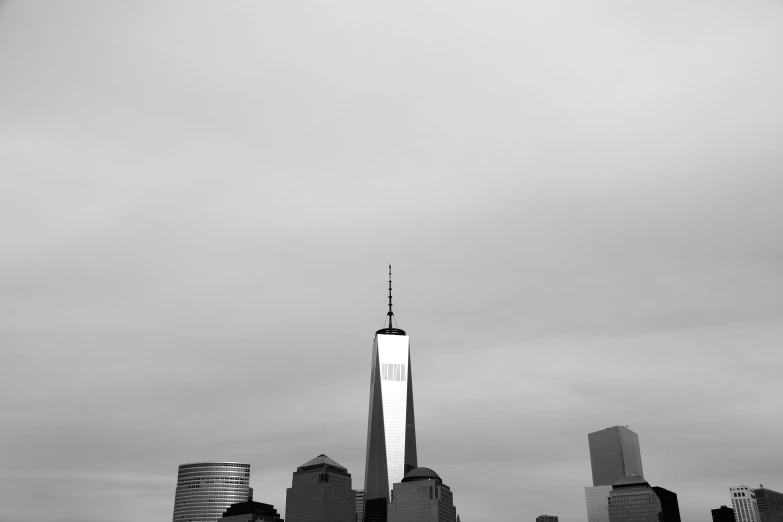 an airplane is flying over a city skyline