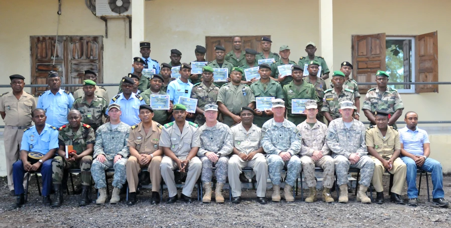 military people in uniform posing for a po